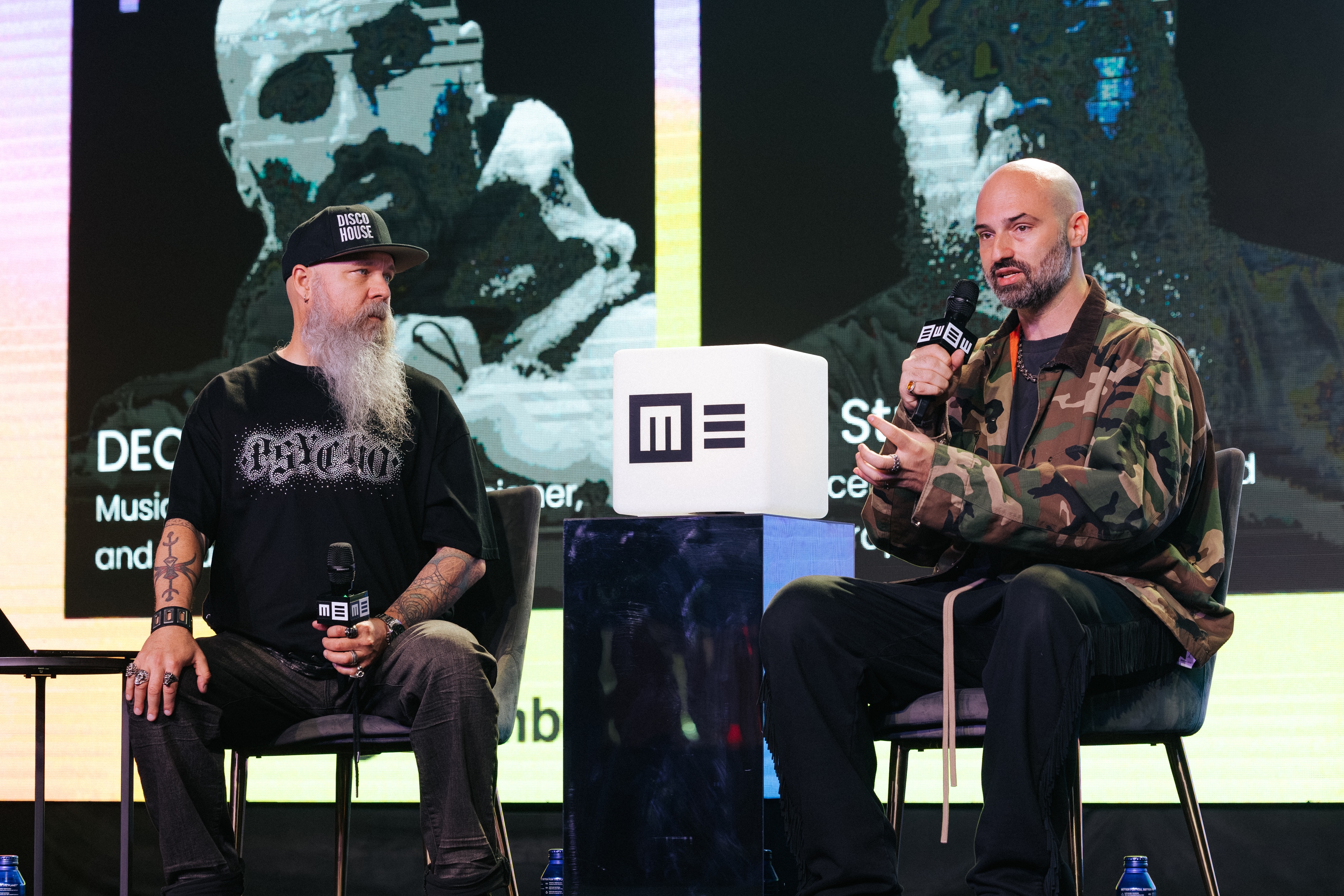 Jeff Straw interviewing DECAP during a fireside chat in front of a live audience