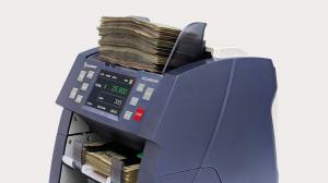 AccuBANKER AB8000 CashGrader semi-fitness bill sorter with full color TFT touchscreen displaying mixed currency totals and dual bill sorting pockets loaded with cash