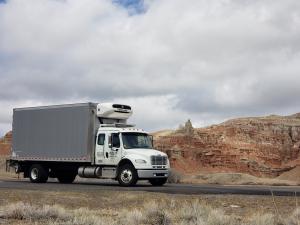 An Atelier 4 climate-controlled transport vehicle in transit across the American West.