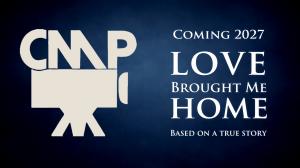 Dark blue poster with a vintage camera logo on the left and white serif text on the right reading “Coming 2027 — Love Brought Me Home — Based on a true story.” Promotional graphic for a POW film by an NC filmmaker.