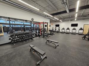 A fully equipped training gym with weights and functional equipment