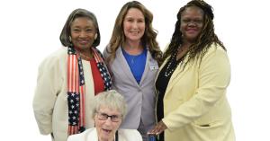 Senators Andrea Stewart-Cousins and Lea Webb celebrate Veteran of the Year Award pose smiling to celebrate with Dr. Susan Herson and her Mom, Sallie Herson
