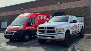 Carolina Pro Restoration branded van and truck outside the company's new Fort Mill, SC headquarters