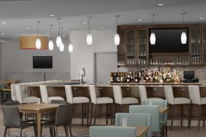 Image of the Garden Grille & Bar located inside the Hilton Garden Inn Greensboro Airport which serves elevated breakfast and dinner options to its guests.