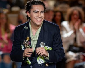Designer Evan Hirsch smiles on the runway after his NYFW x ShopGoodwill.com Show in September 2025