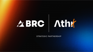 BRC Imagination Arts and AtharX logos side by side on a black background with orange and blue gradient lighting, beneath the words Strategic Partnership.