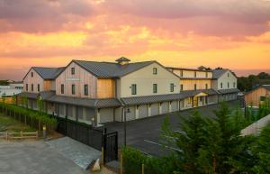 An angled view of the Nantucket storage facility showing a glimpse of the covered parking spaces.