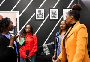 Charmaine James, Founder of Locsanity, engages with attendees during the Locsanity All Across America Tour stop at Underground HTX in Houston.