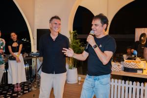 Dean Oram and Chandrashekhar Joshi speaking to guests at Casa Boho Rooftop during the Meet the Game Changers event.