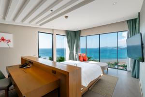 Hilltop Ocean View Suite with panoramic Andaman Sea views at Hyatt Regency Phuket Resort.