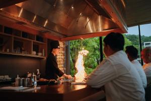 Chef performing teppanyaki cooking at Mizu restaurant in Hyatt Regency Phuket Resort.