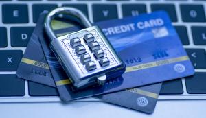 Image of keyboard, credit cards and padlock.