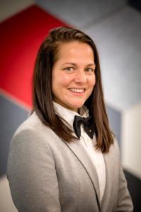 Headshot photo shows Andjelka Pavlovic, Ph.D., wearing a gray blazer and white blouse