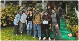 StoryVid video production team standing together outside a home while on location for a commercial video shoot in Kentucky.
