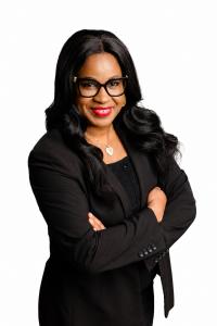 Professional headshot of Anita Eboka, MBA, financial literacy advocate, speaker, and financial services professional based in McKinney, Texas.