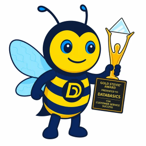 DBee, the DATABASICS mascot, holds the Gold Stevie® Award in the Customer Support category in The 24th Annual American Business Awards®.