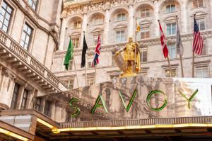 Bespoke luxury furniture inside a Savoy Hotel London suite, showcasing the master-crafted wooden desks, elegant seating, and premium lighting fixtures available in the upcoming public auction.