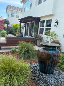 South Canyon Construction Inc. Planting New Trees After Landscape Installation Project