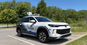 Front view of a Citylogix VW survey vehicle with NIRA Dynamics' Tire Grip Indicator (TGI) mounted at the front for collecting IRI road-roughness data.