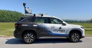 Side view of a Citylogix VW survey vehicle equipped with NIRA Dynamics' Tire Grip Indicator (TGI) for collecting IRI road-roughness data.