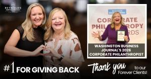 A graphic banner with Debbie and Sarah Reynolds, celebrating Reynolds EmpowerHome Team ranking number 1 on the Washington Business Journal's 2026 Top Corporate Philanthropists list, featuring the company logo and a text overlay thanking clients for their 