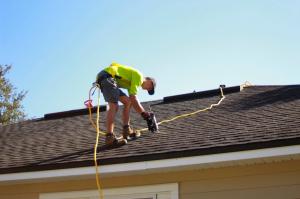 Contractor working on roof