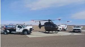 Helicopter and fueling trucks