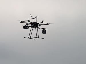 A hexcopter equipped with FlightHorizon PILOT hovering at the Oklahoma State University Uncrewed Aircraft Flight Center