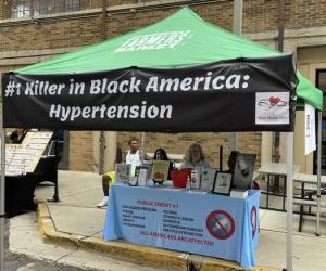 The display booth at the Springfield, OH farmer's market perfectly conveys the message that hypertension is the #1 killer of Black Americans.