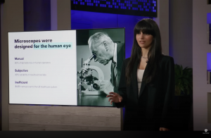 Jeyla Sadikova presenting beside a slide reading “Microscopes were designed for the human eye” during Meet the Drapers Season 9.