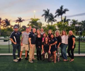 Military Veteran Team at LPT Realty group photo at sunset in Tampa Bay, Florida - ranked #1 in Florida and #10 in the nation for transaction sides by RealTrends Verified 2025.