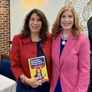 Goody PR Founder and “Award-Winning Publicity” Author Liz H. Kelly shared how to do public relations tips at the National Press Club in Washington D.C. in June 2026 during a book talk for professionals, including entrepreneur Kim Curran, In Two Places.