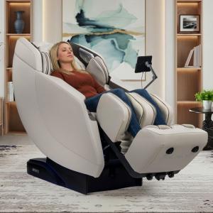 Gray massage chair with a woman enjoying a massage