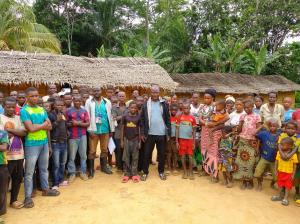 Members of Botsike Village Ingende Territory, Democratic Republic of Congo pose with Jean-Léon Kambale and Mardoche Bokonga.