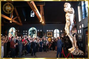 Guests photograph Michelangelo's Pure Silver David during its official unveiling at Museo Michelangelo in Battle Ground, Washington. The sculpture was certified as the Largest Pure Silver Sculpture (Supported) and Heaviest Pure Silver Sculpture.