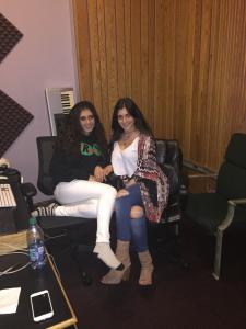 Farrah Mechael and Tamara Mechael seated together in a professional recording studio during a music session.