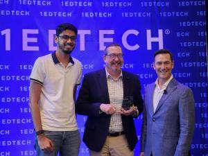 2026 1EdTech Learning Impact Award -- pictured from left -- Malav Shah, Unicon's UX Developer, Norman Bier, Director of CMU OLI and Executive Director of Learnvia, and Curtiss Barnes, CEO of 1EdTech Consortium.