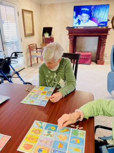 Seniors participating in a therapeutic memory care activity at Glory Days.