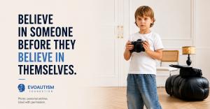 Young autistic boy holding a Canon camera, featured in Evoautism Foundation's awareness campaign with the message: Believe in someone before they believe in themselves.