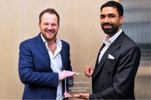 Prem Jethwa-Odedra of Biteluxe receiving the Grant Thornton Ones to Watch 2026 plaque from Charles Cusworth of Grant Thornton
