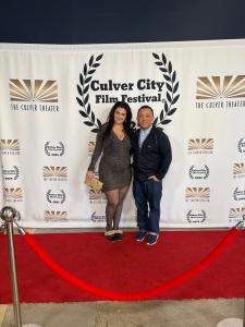 Tamara Mechael and filmmaker Bryan Huynh posing together at the Culver City Film Festival.