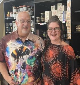 Jeff Garner and Jennifer Lytle, founders of Bee-Licious Honey in Portland, Oregon, inside their Honey House featuring rare varietal honeys including Health Harvest Tualang Honey.