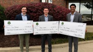 Team members at Magnolia Acquisitions celebrate the results of hard work, professional development, and performance-driven growth.