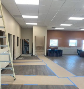 Ponce’s Quality Painting Inc. conducting precise interior painting and site protection for a commercial property in Visalia, CA.