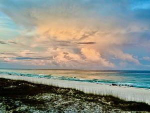 Image of Pensacola Beach shoreline at sunset