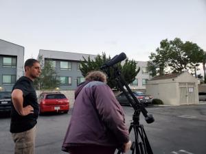 Setting up the Binoculars to view the Moon at the First Light Party