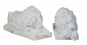 Late 20th century pair of carved marble recumbent lions. Estimate: $4,000-$6,000