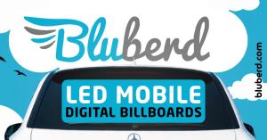 Bluberd mobile digital billboard display installed on the rear window of a vehicle for advertising in Greater Orlando.