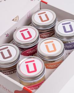 Jarlicious Cupcakes Boxed and labelled viewed from the top showing the colour of each label.