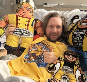 Foley with t-shirt and Plushie in hospital January 2026